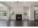 Spacious living room featuring a cozy fireplace, hardwood floors, and recessed lighting at 1463 Edgebrook Ne Ct # 14, Atlanta, GA 30329