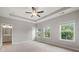 Main bedroom has trey ceilings, windows, and adjoins the bathroom at 1463 Edgebrook Ne Ct # 14, Atlanta, GA 30329