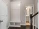 Bright mudroom with custom built-ins, storage cubbies, and dark wood floors in neutral colored home at 1463 Edgebrook Ne Ct # 14, Atlanta, GA 30329
