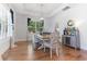 Bright dining room featuring hardwood floors and stylish decor at 203 Belmont Park Dr, Canton, GA 30115