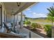 Inviting front porch with seating and scenic neighborhood views at 203 Belmont Park Dr, Canton, GA 30115