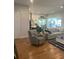 Comfortable living room showcases seamless flow into the kitchen, perfect for gatherings at 203 Belmont Park Dr, Canton, GA 30115