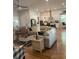Spacious living area that flows into a modern kitchen, ideal for Gathering gatherings at 203 Belmont Park Dr, Canton, GA 30115