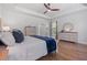 Cozy main bedroom with hardwood floors, tray ceiling and plentiful drawer storage at 203 Belmont Park Dr, Canton, GA 30115