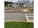 New development street view with lush green grass and landscaping at 203 Belmont Park Dr, Canton, GA 30115