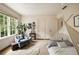 Comfortable bedroom featuring lots of natural light and a whimsical TeePee at 241 Nacoochee Nw Dr, Atlanta, GA 30305