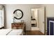 Bright bedroom showcasing a wooden dresser with a decorative mirror above at 241 Nacoochee Nw Dr, Atlanta, GA 30305