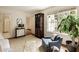 Cozy bedroom featuring hardwood floors, seating area, and lots of natural light at 241 Nacoochee Nw Dr, Atlanta, GA 30305