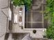 Aerial shot of a relaxing outdoor deck with stylish furniture, potted flowers, and a peaceful ambiance at 241 Nacoochee Nw Dr, Atlanta, GA 30305