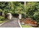 Picturesque garden area, with a gateway entrance and raised beds for growing plants at 241 Nacoochee Nw Dr, Atlanta, GA 30305