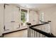 Upstairs hallway with closets, bench and window at 241 Nacoochee Nw Dr, Atlanta, GA 30305