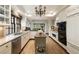 Bright kitchen with stainless steel appliances, island and hardwood floors at 241 Nacoochee Nw Dr, Atlanta, GA 30305