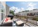 Inviting back deck featuring outdoor seating and a view of the surrounding neighborhood at 361 Watson Ave, Woodstock, GA 30189