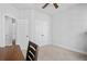 Bedroom features include neutral carpet, ceiling fan, and walk-in closet at 361 Watson Ave, Woodstock, GA 30189