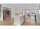 Gourmet kitchen with a spacious island, stainless steel appliances, and open concept design at 361 Watson Ave, Woodstock, GA 30189