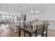 Modern kitchen with large island, stainless steel appliances, and open floor plan at 361 Watson Ave, Woodstock, GA 30189
