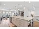 Spacious kitchen features a large island, stainless steel appliances, and open layout at 361 Watson Ave, Woodstock, GA 30189