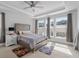 Main bedroom suite with tray ceilings and large windows for ample natural light at 361 Watson Ave, Woodstock, GA 30189