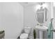 Stylish powder room with pedestal sink, modern fixtures, and clean design at 361 Watson Ave, Woodstock, GA 30189
