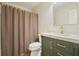 Bathroom featuring an ornate vanity and countertop at 11940 Mountain Laurel Dr, Roswell, GA 30075