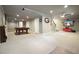 Large game room with billiard table, neutral carpet, recessed lighting, and a ceiling fan at 11940 Mountain Laurel Dr, Roswell, GA 30075