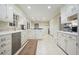 Large eat-in kitchen with stainless appliances and large cabinets at 11940 Mountain Laurel Dr, Roswell, GA 30075