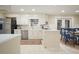 Bright eat-in kitchen with stainless appliances and large cabinets at 11940 Mountain Laurel Dr, Roswell, GA 30075