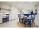 Eat-in kitchen with abundant cabinetry and a breakfast area at 11940 Mountain Laurel Dr, Roswell, GA 30075