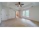 Spacious carpeted bedroom with natural lighting at 3830 Gallant Fox Ct, Duluth, GA 30096
