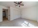 Bedroom featuring neutral carpet and large closet at 3830 Gallant Fox Ct, Duluth, GA 30096