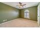 Bedroom features carpet floor, one window and ceiling fan at 3830 Gallant Fox Ct, Duluth, GA 30096