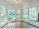 Breakfast nook area featuring multiple windows with views to the backyard at 3830 Gallant Fox Ct, Duluth, GA 30096