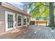 Wooden deck with access to the backyard, perfect for outdoor seating and entertaining guests at 3830 Gallant Fox Ct, Duluth, GA 30096