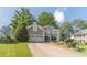 Charming two-story home featuring a well-manicured lawn, two-car garage, and a welcoming front entrance at 3830 Gallant Fox Ct, Duluth, GA 30096