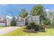 Charming two-story home featuring a well-manicured lawn, two-car garage, and a welcoming front entrance at 3830 Gallant Fox Ct, Duluth, GA 30096