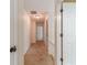 Hallway with carpet floor and several doors at 3830 Gallant Fox Ct, Duluth, GA 30096
