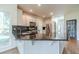 Beautiful kitchen with granite countertops, stainless steel appliances, and views to other rooms at 3830 Gallant Fox Ct, Duluth, GA 30096