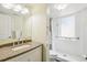 Accessible bathroom featuring a sink and walk-in shower with grab bars at 6878 Brandon Mill Rd, Sandy Springs, GA 30328