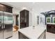 Modern kitchen features a large island, stainless steel appliances, and sleek cabinetry at 6878 Brandon Mill Rd, Sandy Springs, GA 30328