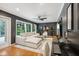 Spacious living room with neutral paint, hardwood floors, and modern decor at 6878 Brandon Mill Rd, Sandy Springs, GA 30328