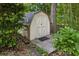 Outdoor shot of backyard shed with greenery surrounding at 6878 Brandon Mill Rd, Sandy Springs, GA 30328