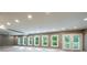 Spacious carpeted basement with recessed lighting, multiple windows, and glass patio doors at 265 Landfall Rd, Atlanta, GA 30328