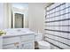 Bathroom featuring vanity, mirror, toilet, and stylish shower curtain with a simple pattern at 5640 Terremont Cir, Norcross, GA 30093