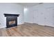 Cozy living room with modern fireplace and neutral color palette at 5640 Terremont Cir, Norcross, GA 30093