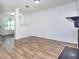 Living room with modern vinyl plank flooring and ample natural light at 5640 Terremont Cir, Norcross, GA 30093