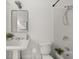 Clean and modern bathroom featuring white tile, a shower, and a classic pedestal sink at 121 Fulton Se Way, Atlanta, GA 30312