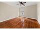 Cozy bedroom features ceiling fan and bright window at 121 Fulton Se Way, Atlanta, GA 30312