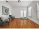 Bonus room with hardwood floors, neutral paint, French doors, and plenty of natural light at 121 Fulton Se Way, Atlanta, GA 30312