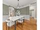 This dining room boasts hardwood floors, updated trim, and modern lighting at 121 Fulton Se Way, Atlanta, GA 30312