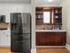 Bright kitchen boasts stainless steel appliances, white cabinets, and a wooden floor at 121 Fulton Se Way, Atlanta, GA 30312